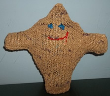 stuffed monster toy knit from brown plastic bags and stuffed with plastic bag scraps--not suitable for children