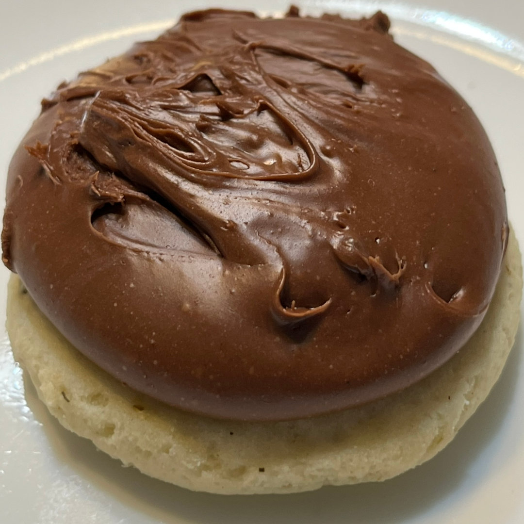 sugar cookie topped with a thick layer of fudge