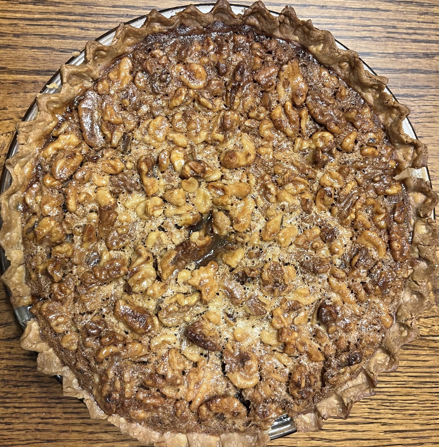 Chocolate Walnut Pie on a wooden tabletop